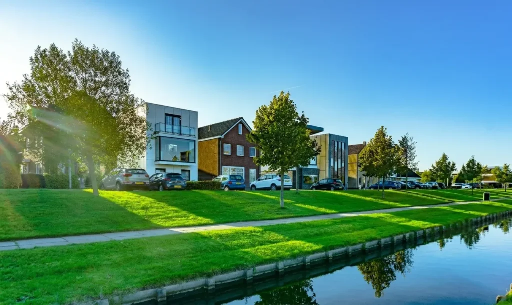 Canal facing houses with a beautiful garden