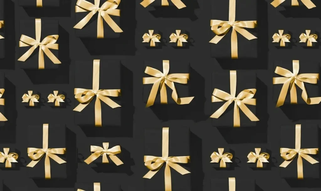 Black gift boxes with yellow ribbons