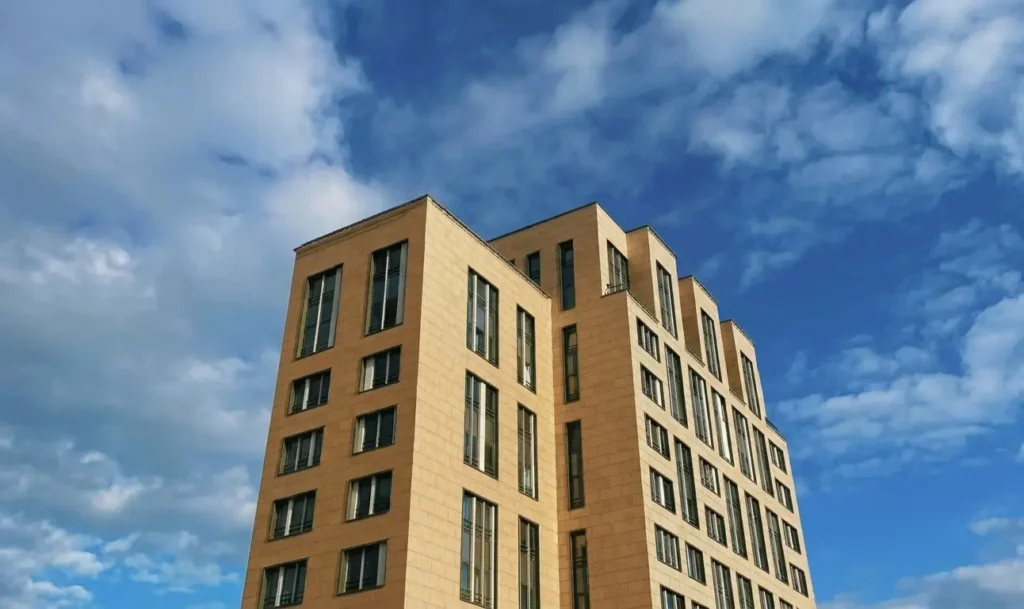 Brown apartment complex on a sunny day