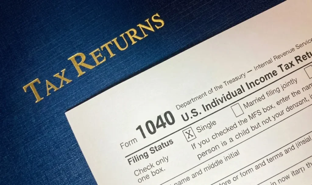 US Income Tax Return Form 1040 with blue background